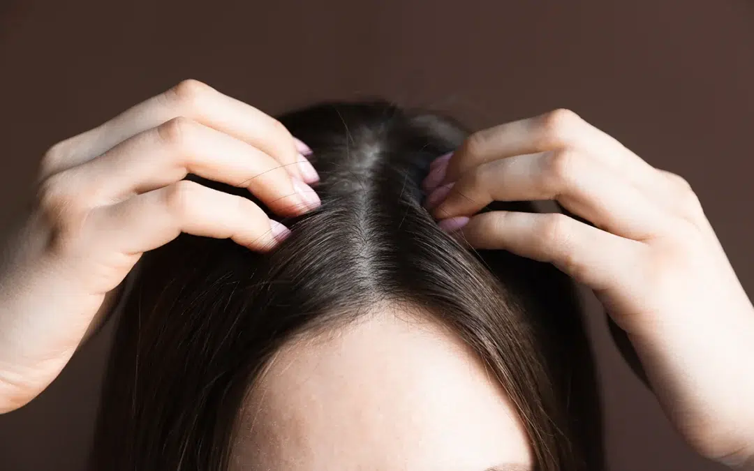 woman with healthy hair roots and scalp